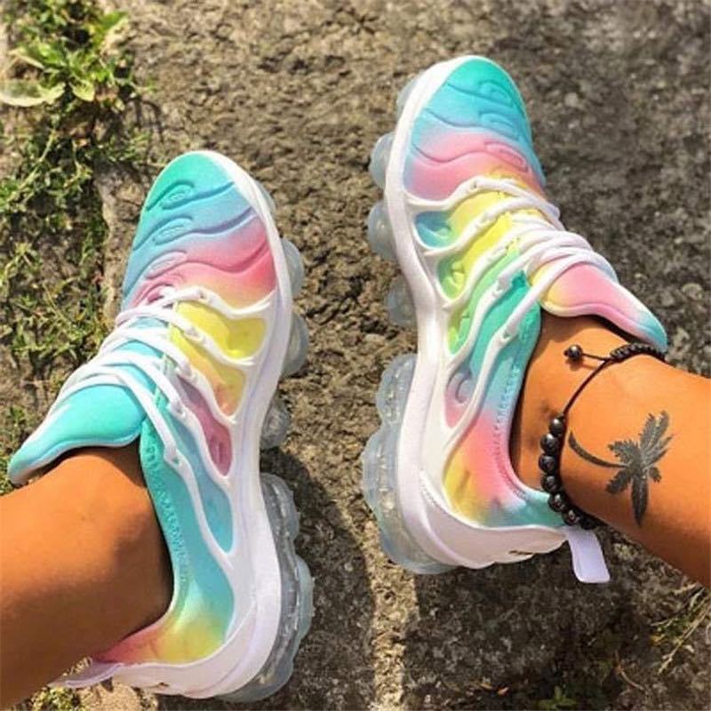 Sneakers with candy-colored soft bottoms